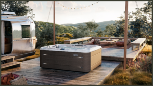 A visual breakdown or infographic asset displaying a sleek modern hot tub with callouts pointing to thick perimeter insulation, a heavy-duty thermal cover, and a high-efficiency heating system.