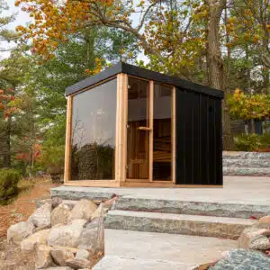 Premium Outdoor Orion Sauna featuring an elegant modern design, crafted for a luxury garden wellness installation.