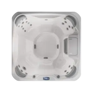 Top-down, overhead architectural photograph of the Sundance 680 Series Prado hot tub, highlighting its spacious 6-seater interior and ergonomic, multi-level seating layout.