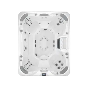 Top-down, overhead architectural photograph of the Sundance 880 Series Aspen hot tub, showcasing its massive, 6+ seater lounge-free interior layout and ergonomic multi-level seating.