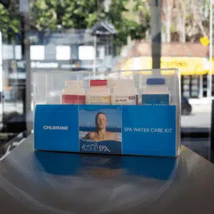 A professional e-commerce product group shot of the ACTI Chlorine Spa Starter Kit, featuring essential chemical sanitisers, balancers, and testing supplies for hot tubs.