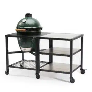 A professional e-commerce product shot of the Big Green Egg Modular Nest Expansion Frame for the Large EGG, configured with premium, heavy-duty stainless steel shelf inserts to create a sleek, industrial-style outdoor food-prep station.