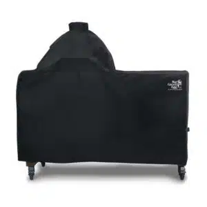 A professional e-commerce product shot of the durable Big Green Egg Cover E, tailored to fit a Large EGG housed in an outdoor cooking table, featuring heavy-duty black fabric and the signature logo.