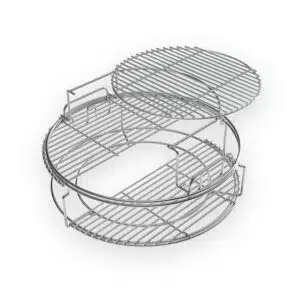 A professional e-commerce product shot of the comprehensive Big Green Egg 5 Piece EGGspander Kit, displaying the stainless steel multi-level racks, convEGGtor basket, and two half-moon cooking grids arranged together