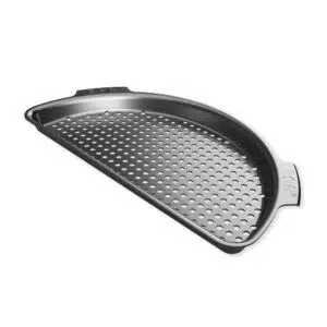 A professional e-commerce product shot of the Big Green Egg Half Moon Perforated Grid for the EGGspander System, showcasing its heavy-duty non-stick surface and precise perforations designed to sit inside a multi-level rack.