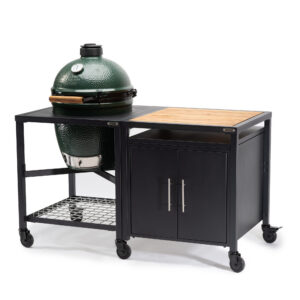 A professional e-commerce product shot of the Big Green Egg Modular Nest and Expansion Cabinet system for the Large EGG, showcasing the heavy-duty powder-coated steel frame holding the Large EGG alongside the matching weather-resistant storage cabinet.