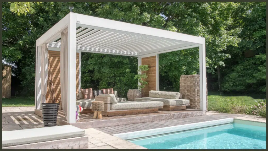 A classic architectural view of a luxury timber pergola with open overhead crossbeams, beautifully draped with trailing green vines, creating a dappled shadow pattern across a premium stone terrace.